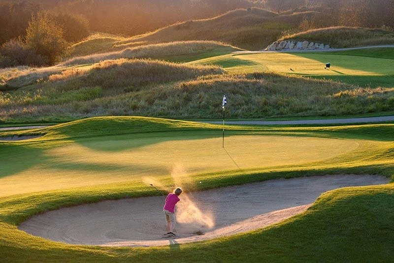 Golf Player in a Sand Bunker